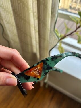 Prada Green Tortoise Sunglasses with Gold Logo